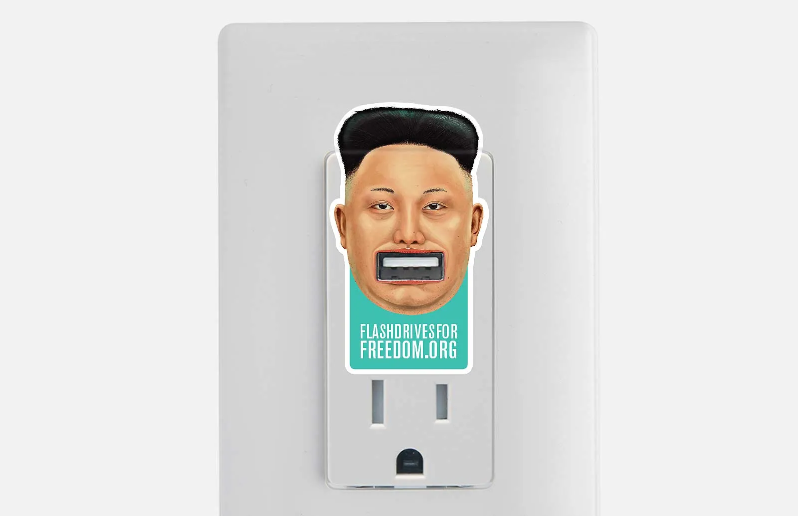 A Flash Drives for Freedom sticker on a USB port