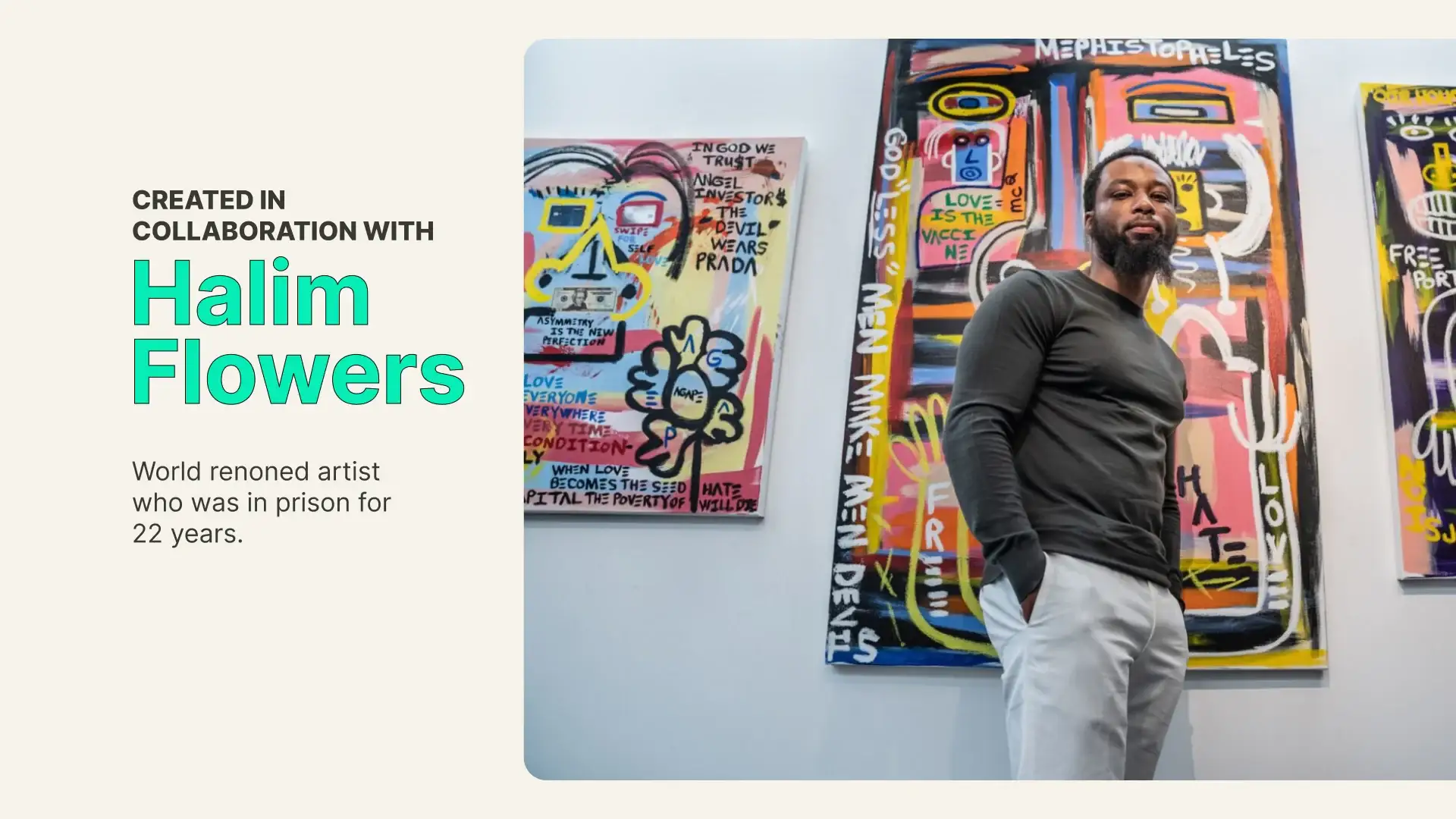 Halim Flowers, who was in prison for 22 years, standing beside his paintings